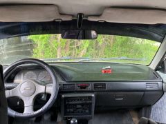 Сүрөт унаа Mazda 323