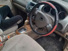 Photo of the vehicle Honda Fit Aria