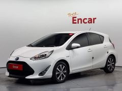 Фото авто Toyota Prius c