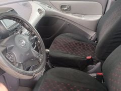 Фото авто Nissan Almera Tino