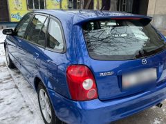 Фото авто Mazda 323