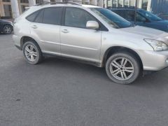 Photo of the vehicle Lexus RX