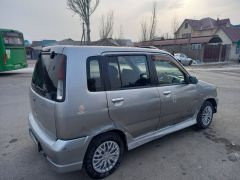 Сүрөт унаа Nissan Cube