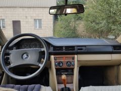 Сүрөт унаа Mercedes-Benz W124