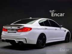 Photo of the vehicle BMW M5