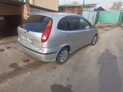 Photo of the vehicle Nissan Almera Tino