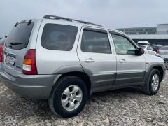 Photo of the vehicle Mazda Tribute