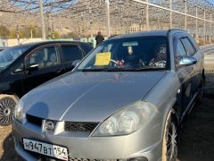 Photo of the vehicle Nissan Wingroad