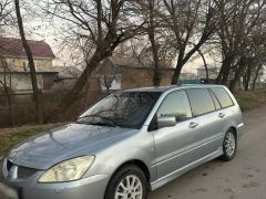 Фото авто Mitsubishi Lancer