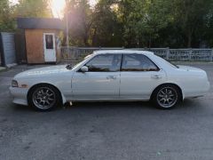 Фото авто Nissan Laurel