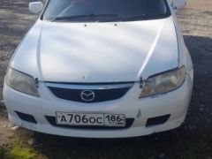 Photo of the vehicle Mazda 323