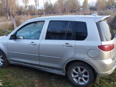 Фото авто Mazda Demio