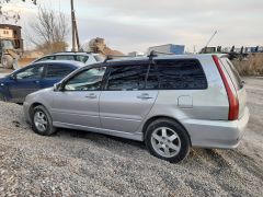 Фото авто Mitsubishi Lancer