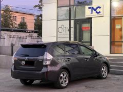 Фото авто Toyota Prius v (+)