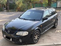 Фото авто Mazda Familia