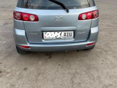 Сүрөт унаа Mazda Demio