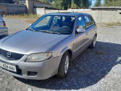 Фото авто Mazda 323