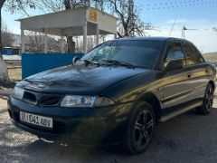 Фото авто Mitsubishi Carisma