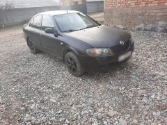 Photo of the vehicle Nissan Almera