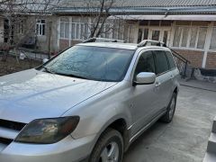 Сүрөт унаа Mitsubishi Outlander