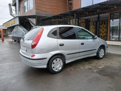 Фото авто Nissan Almera Tino