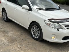 Photo of the vehicle Toyota Corolla