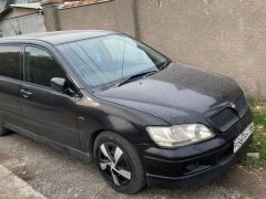 Photo of the vehicle Mitsubishi Lancer