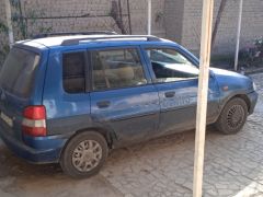 Photo of the vehicle Mazda Demio