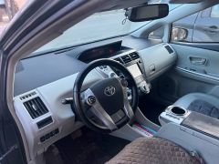 Фото авто Toyota Prius v (+)