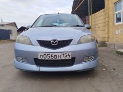 Фото авто Mazda Demio