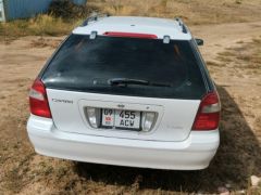 Photo of the vehicle Nissan Cefiro