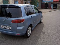 Сүрөт унаа Mazda Demio