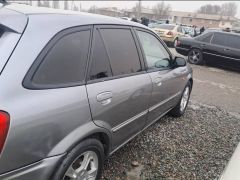 Photo of the vehicle Mazda 323