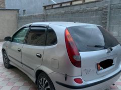 Photo of the vehicle Nissan Almera Tino