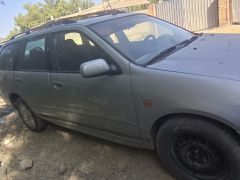 Photo of the vehicle Nissan Primera