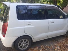 Фото авто Mitsubishi Dingo