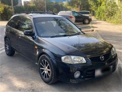 Фото авто Mazda Familia