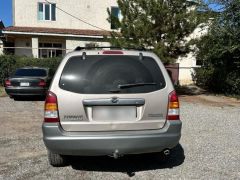 Photo of the vehicle Mazda Tribute