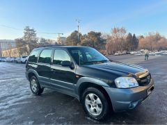 Photo of the vehicle Mazda Tribute