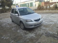 Photo of the vehicle Mazda Demio