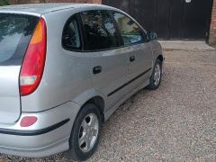 Photo of the vehicle Nissan Almera Tino