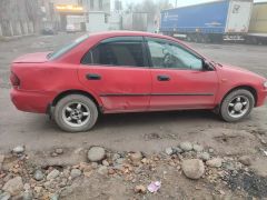 Photo of the vehicle Mazda 323