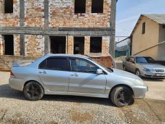 Сүрөт унаа Mitsubishi Lancer