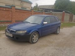 Фото авто Mazda Familia