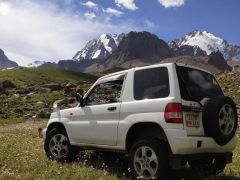 Сүрөт унаа Mitsubishi Pajero iO