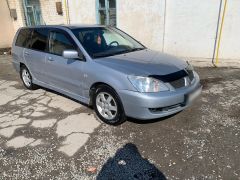 Фото авто Mitsubishi Lancer