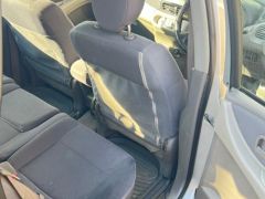 Фото авто Nissan Almera Tino