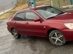 Photo of the vehicle Mitsubishi Lancer