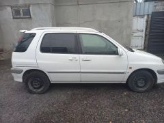 Сүрөт унаа Toyota Raum