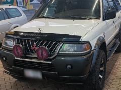 Сүрөт унаа Mitsubishi Montero Sport